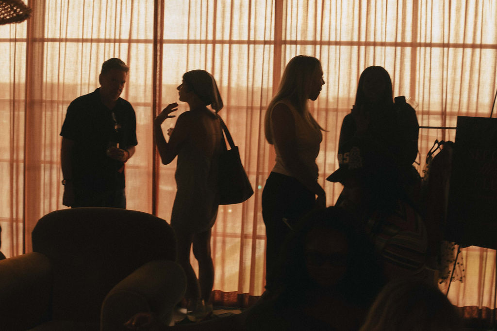 Neighbors at a Legacy South house party
